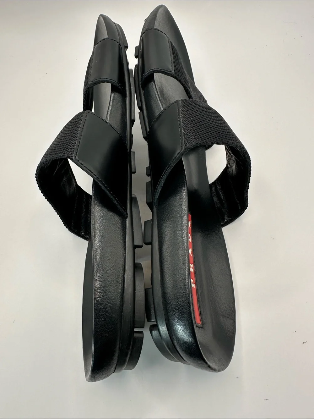 Prada Black Leather and Fabric Double-Strap Slides with Red Insole Detail